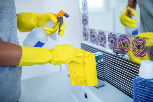 Professional cleaner using safety-focused methods during a routine clean